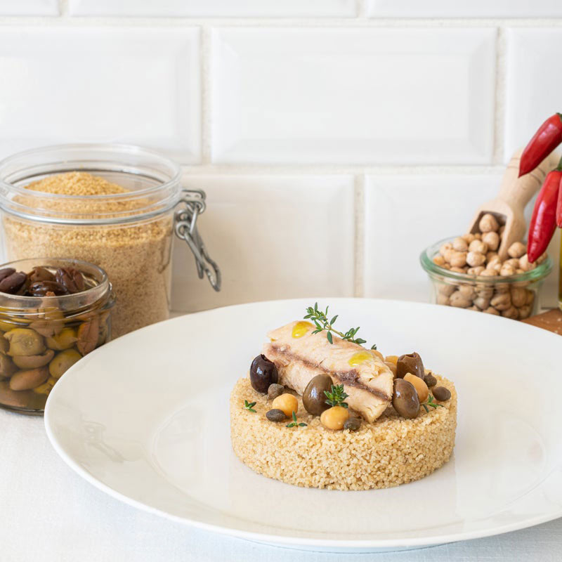 Whole wheat cous cous with mackerel fillets, taggiasche olives and chickpeas